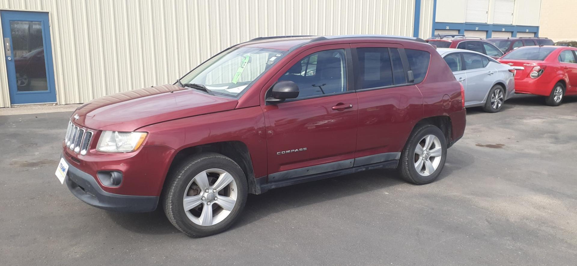 2011 Jeep Compass Sport FWD (1J4NT1FB0BD) with an 2.4L L4 DOHC 16V engine, 5-Speed Manual transmission, located at 2015 Cambell Street, Rapid City, SD, 57701, (605) 342-8326, 44.066433, -103.191772 - CARFAX AVAILABLE - Photo#1